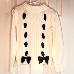Cream Cable-Knit Sweater with Black Ribbon Bows